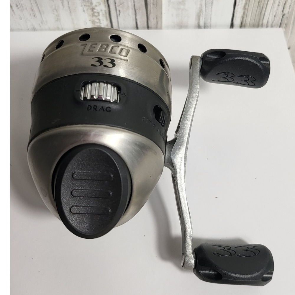 Zebco 33 Spincast Fishing Reel QuickSet Bite Alert Drag System Silver Black